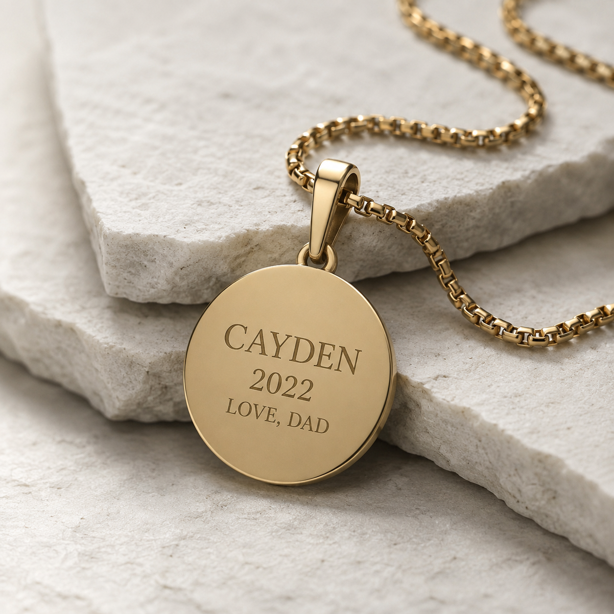 Personalized engraving on a Saint Christopher medal